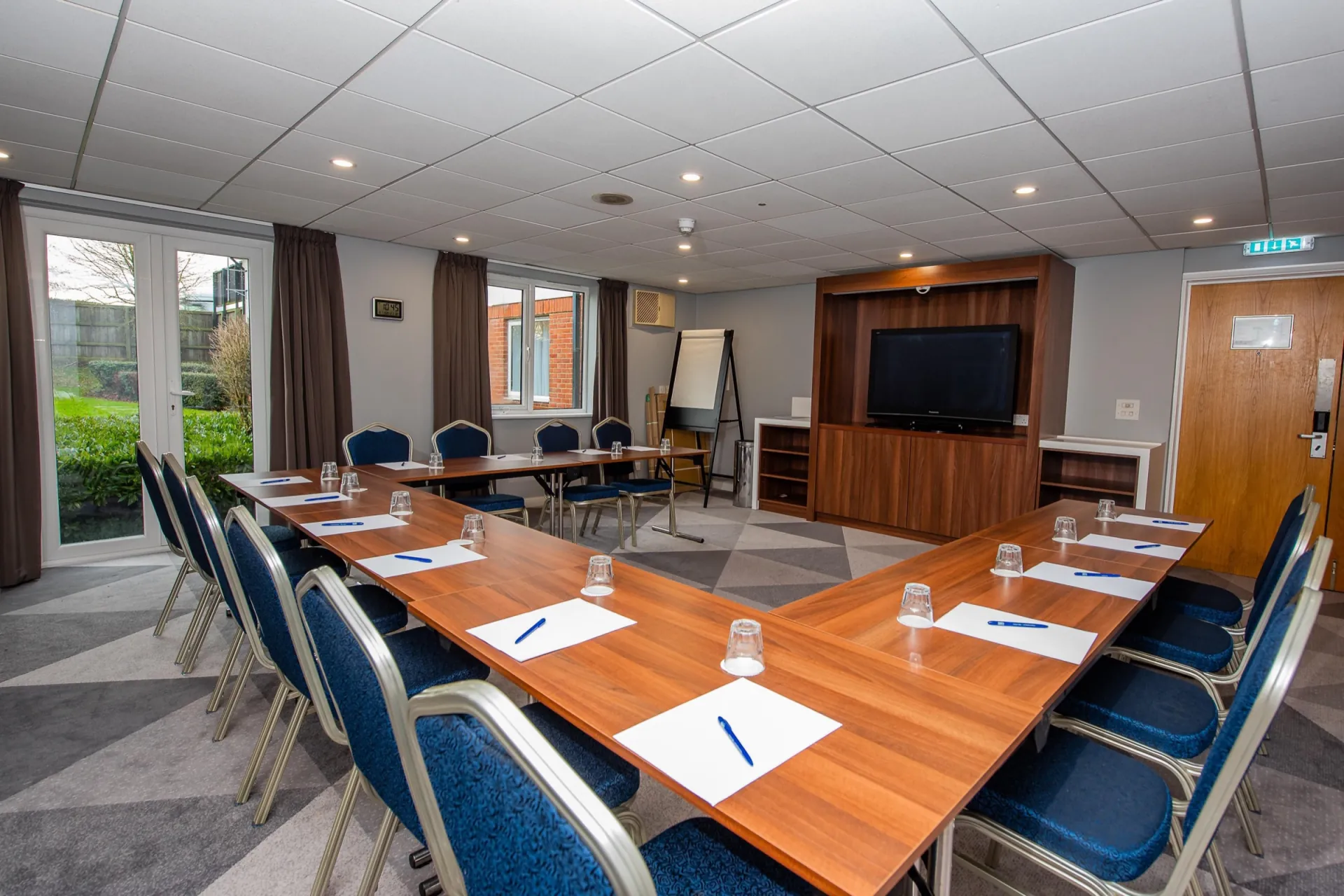 The Medway Room at Holiday Inn Dover set in a U shape with blue chairs
